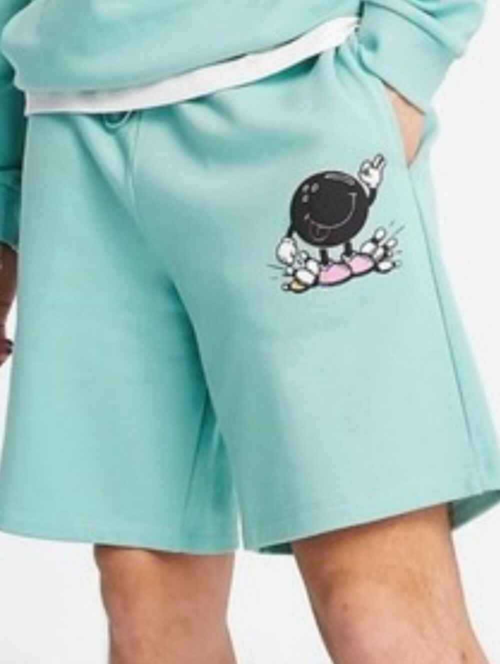 Crooked Tongues Relaxed Teal Shorts Featuring A Bowling Graphic